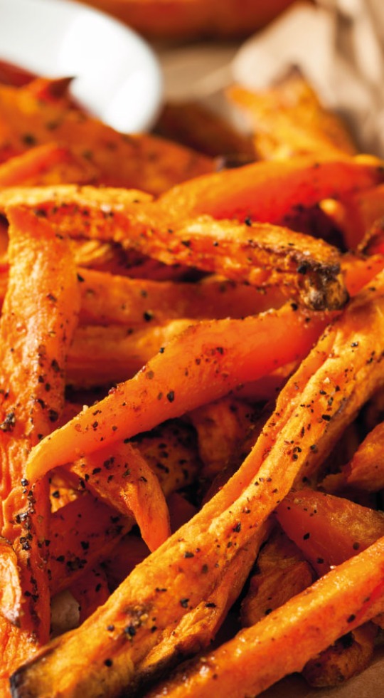 Delicious Burgers and Philly Cheese Steak, Glasgow Close up of crispy sweet potato fries